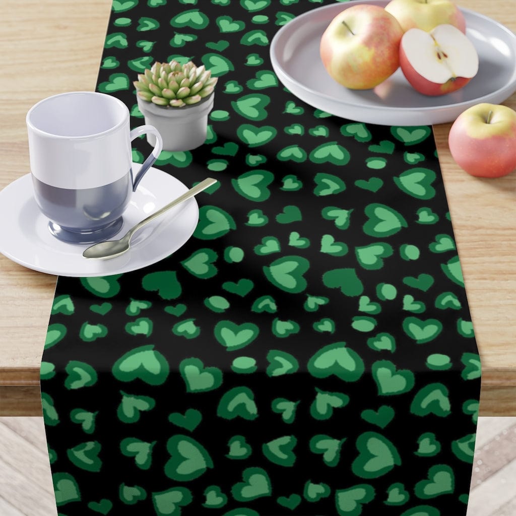 st patricks day table runner with green hearts on a black background