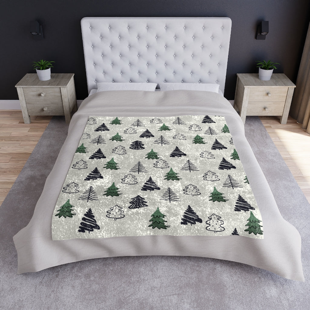 minimalist tree blanket with tree pattern on a white background