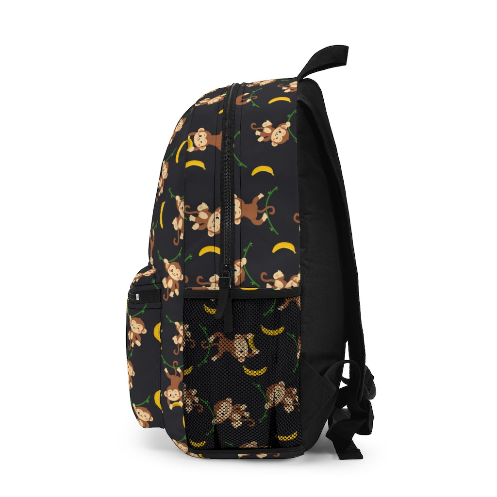 black monkey bookbag with monkey and banana pattern on black background