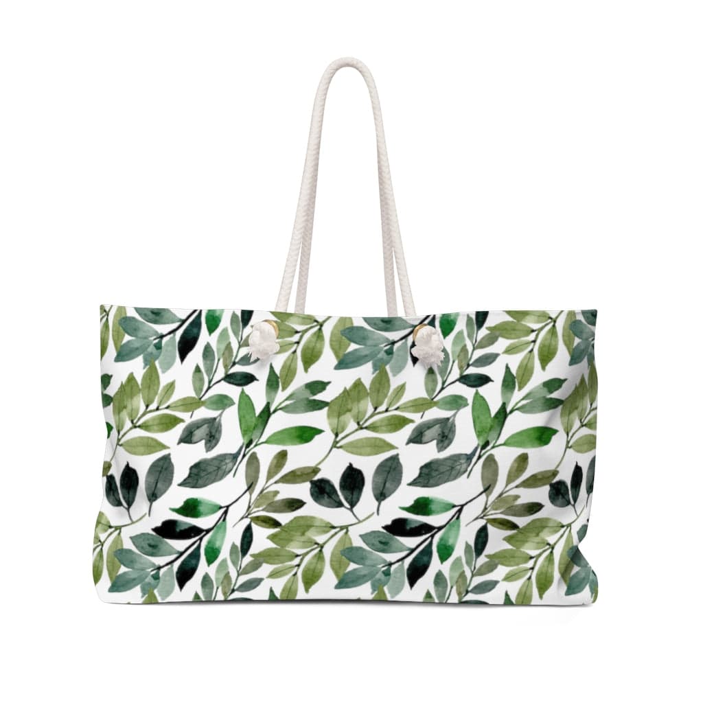 farmhouse leaf weekender bag with blue and green leaves on a white background. Rope handles.