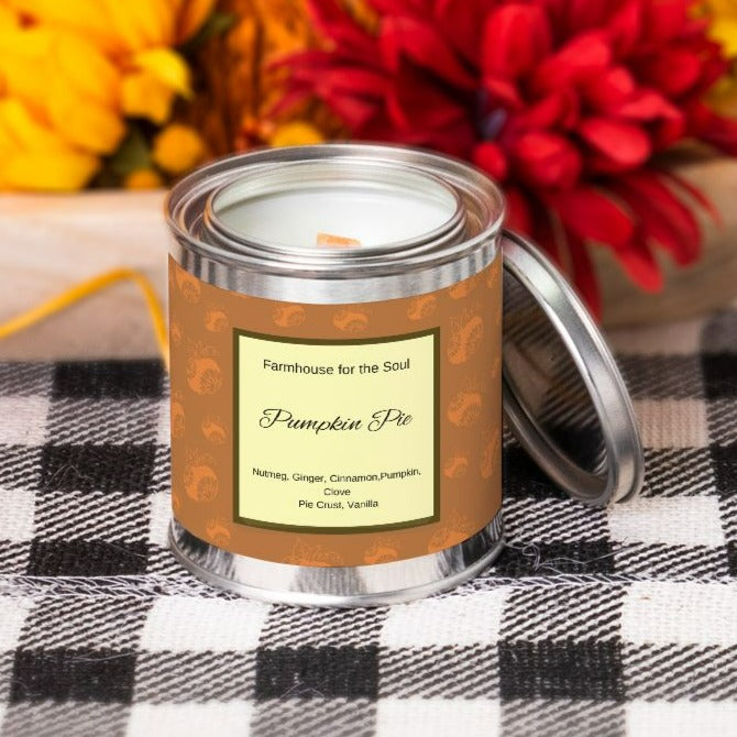fall candle in orange pumpkin pattern in pumpkin pie scent for autumn