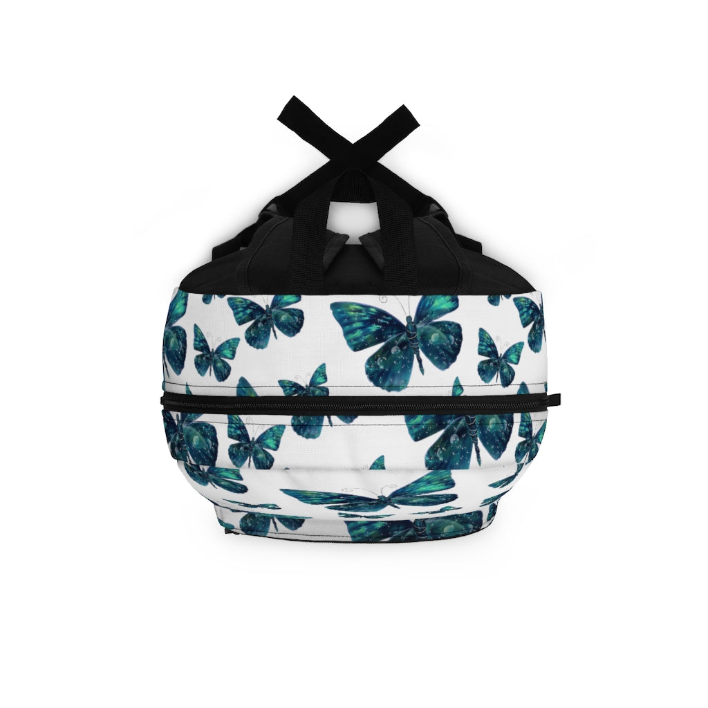 top view of butterfly bookbag with shades of blue butterfly pattern