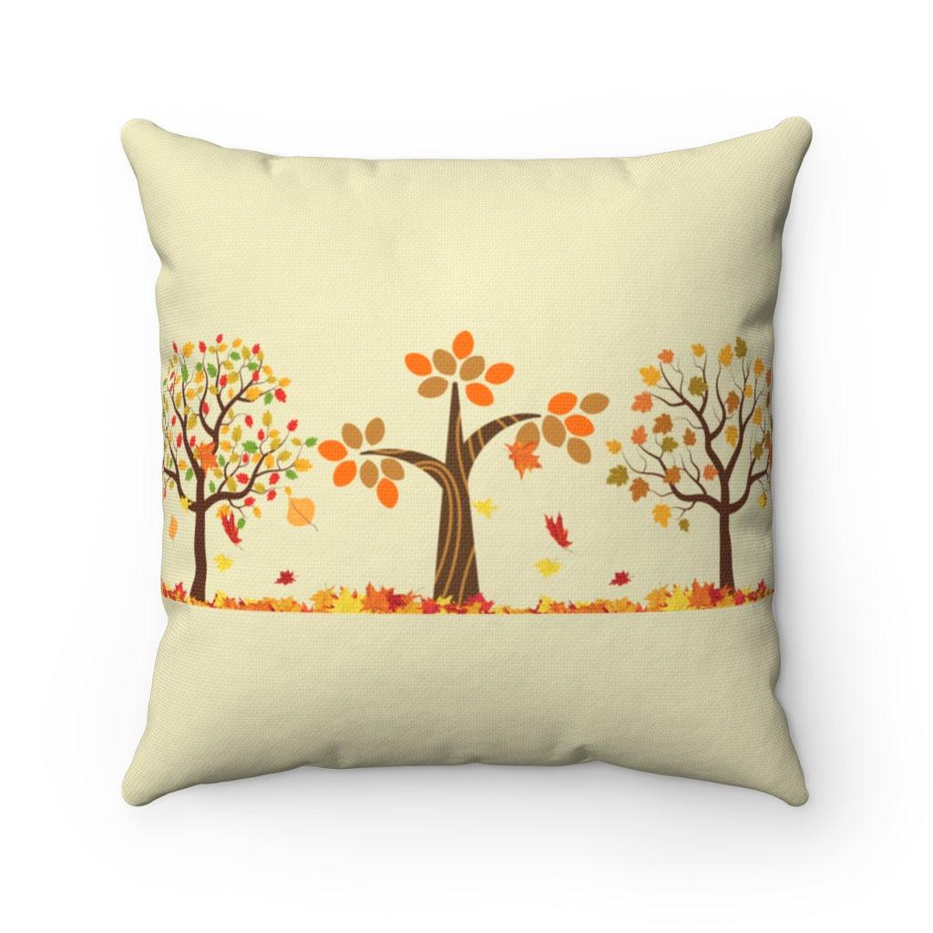 farmhouse fall pillow of changing leaves on trees.