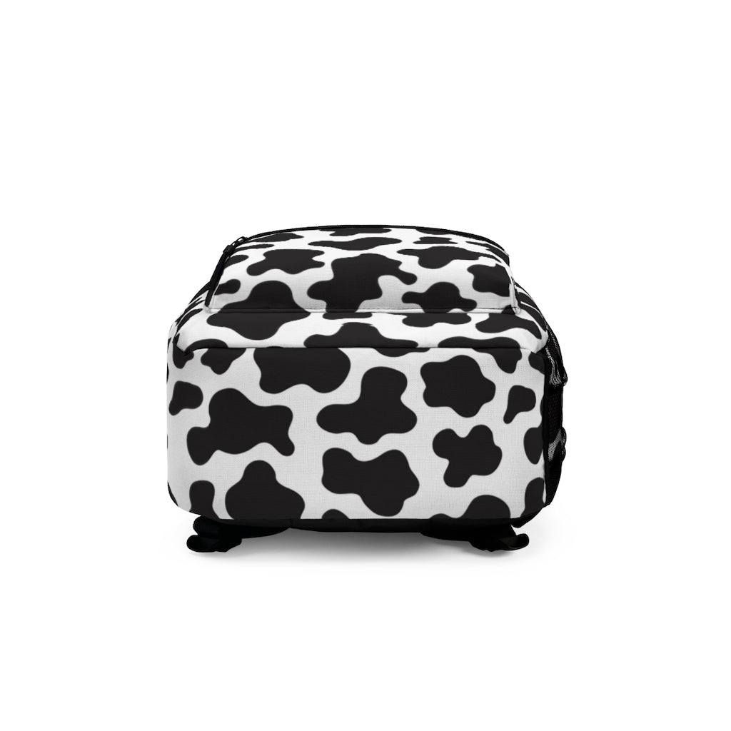 bottom view of cow print bookbag