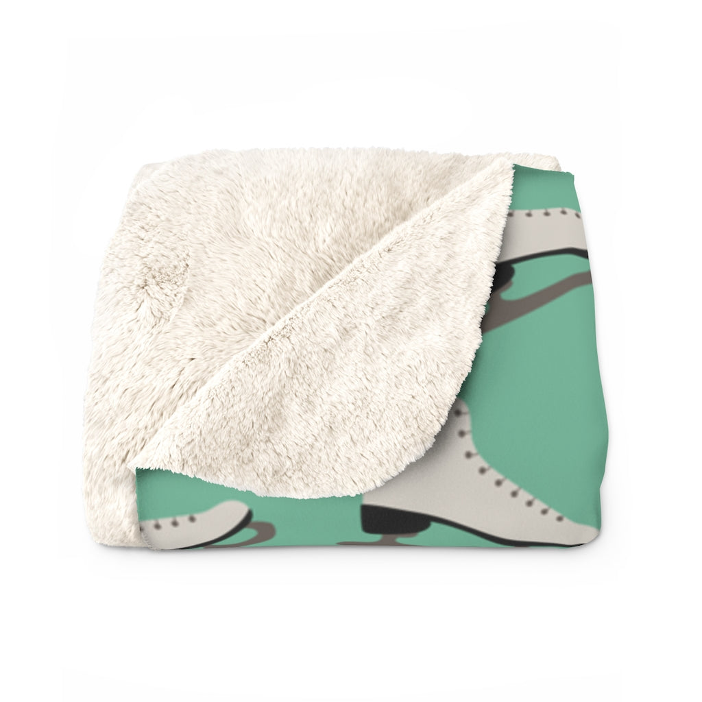 folded view of green ice skating blanket