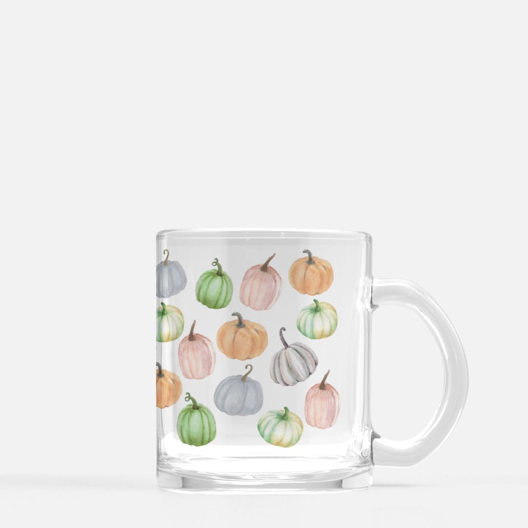 fall glass mug with orange, blue, green an white pumpkin pattern