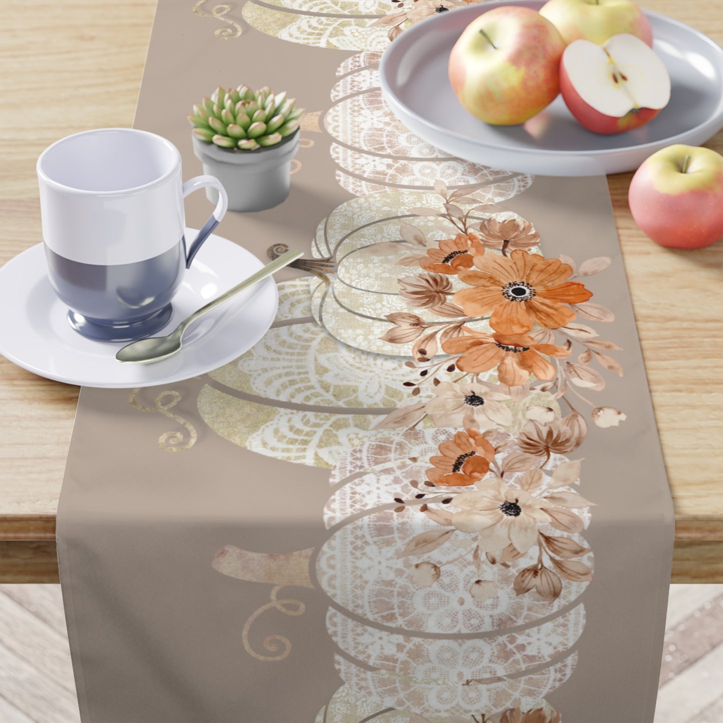 thanksgiving table runner featuring a beige pumpkin table runner with orange and brown floral print
