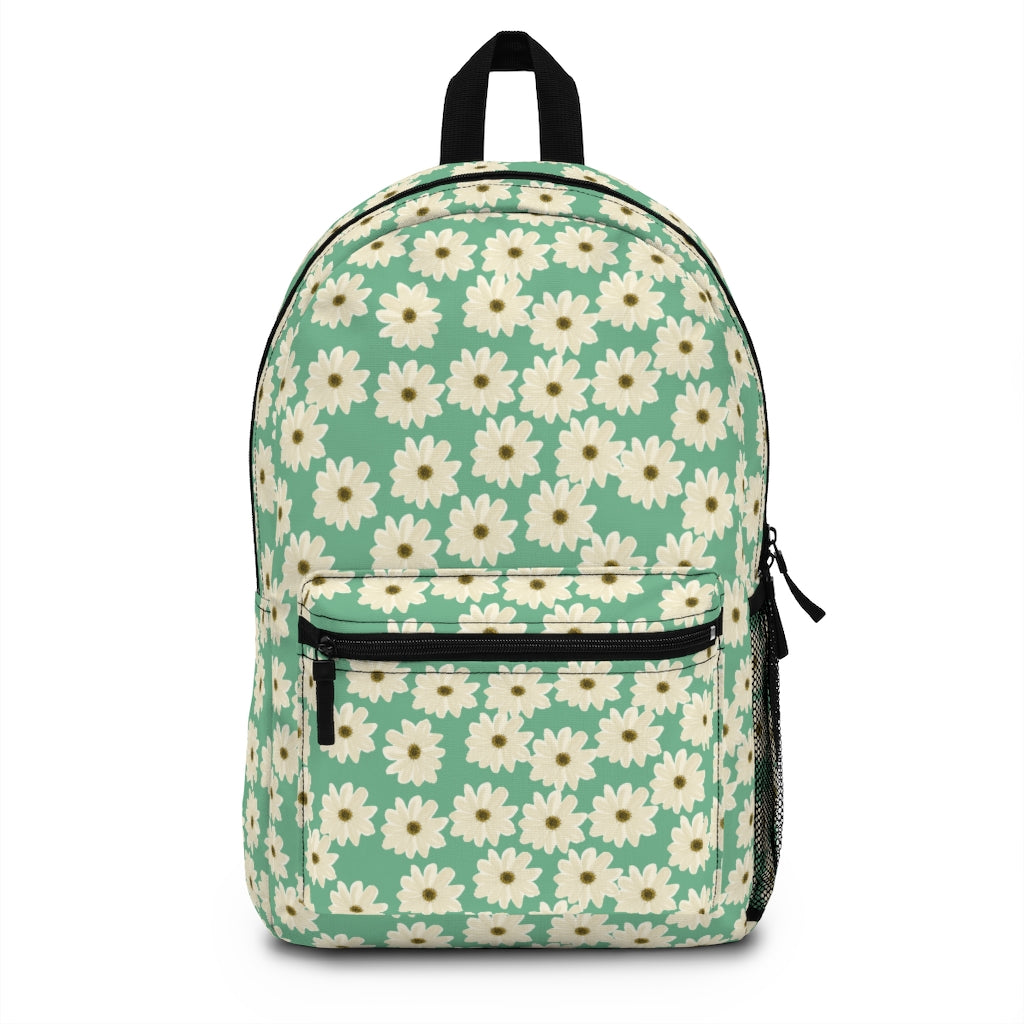 girls green bookbag with white daisy pattern