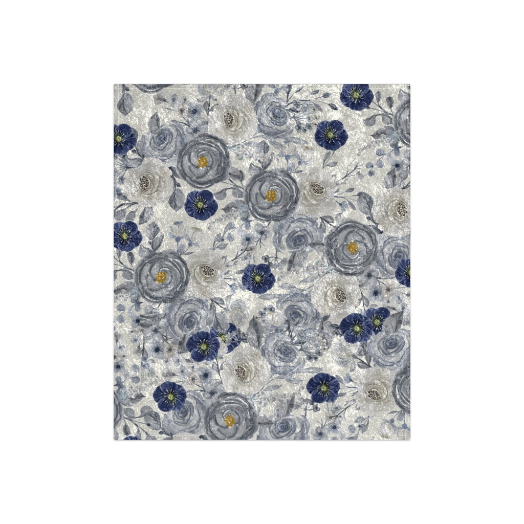flat view of navy blue floral blanket