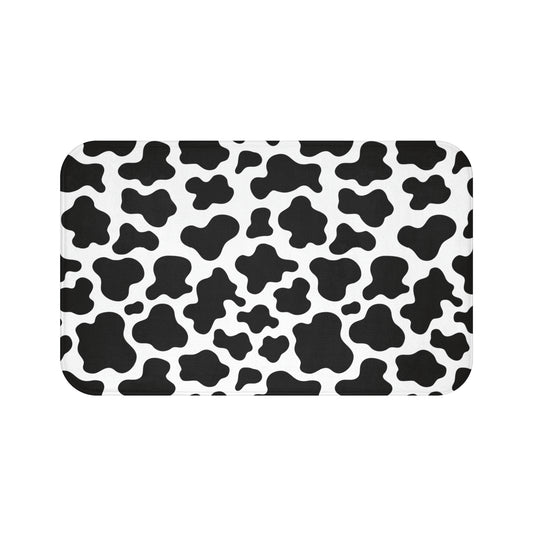 black and white cow print bath mat for farmhouse bathroom decor