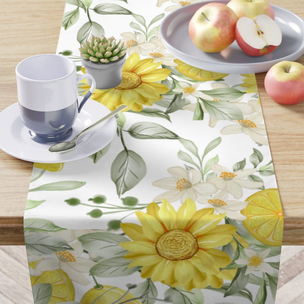 sunflower table runner with yellow and white flowers and lemon tree leaves