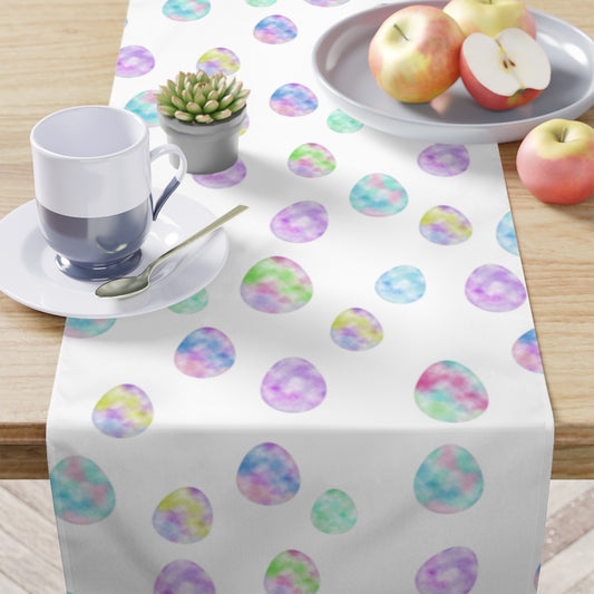 watercolor easter table runner with pink, purple, blue, green and yellow easter eggs