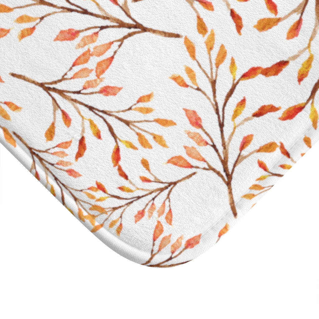 orange, yellow and brown changing leaves bath mat for fall theme decor.