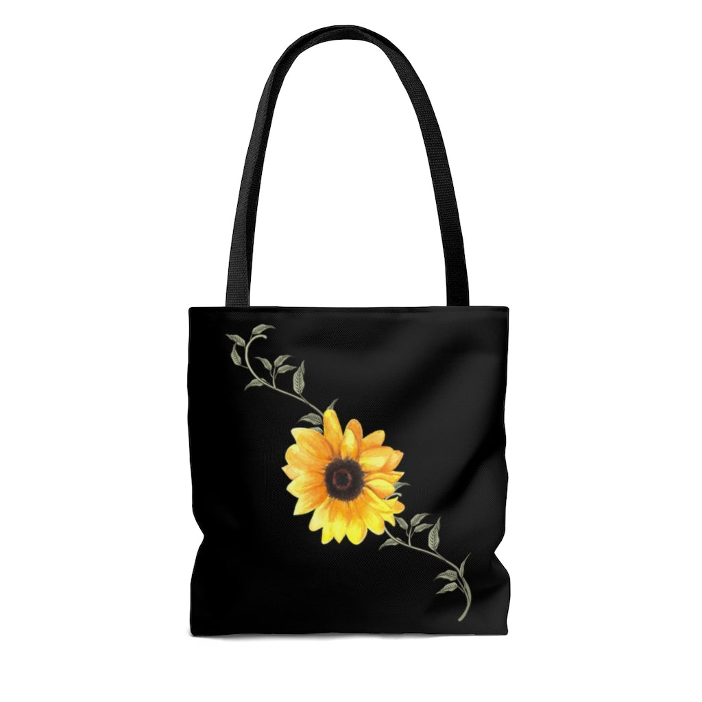 sunflower tote bag with a yellow sunflower and green leaves.