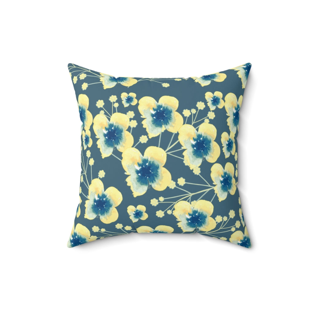 blue and yellow flower pillow