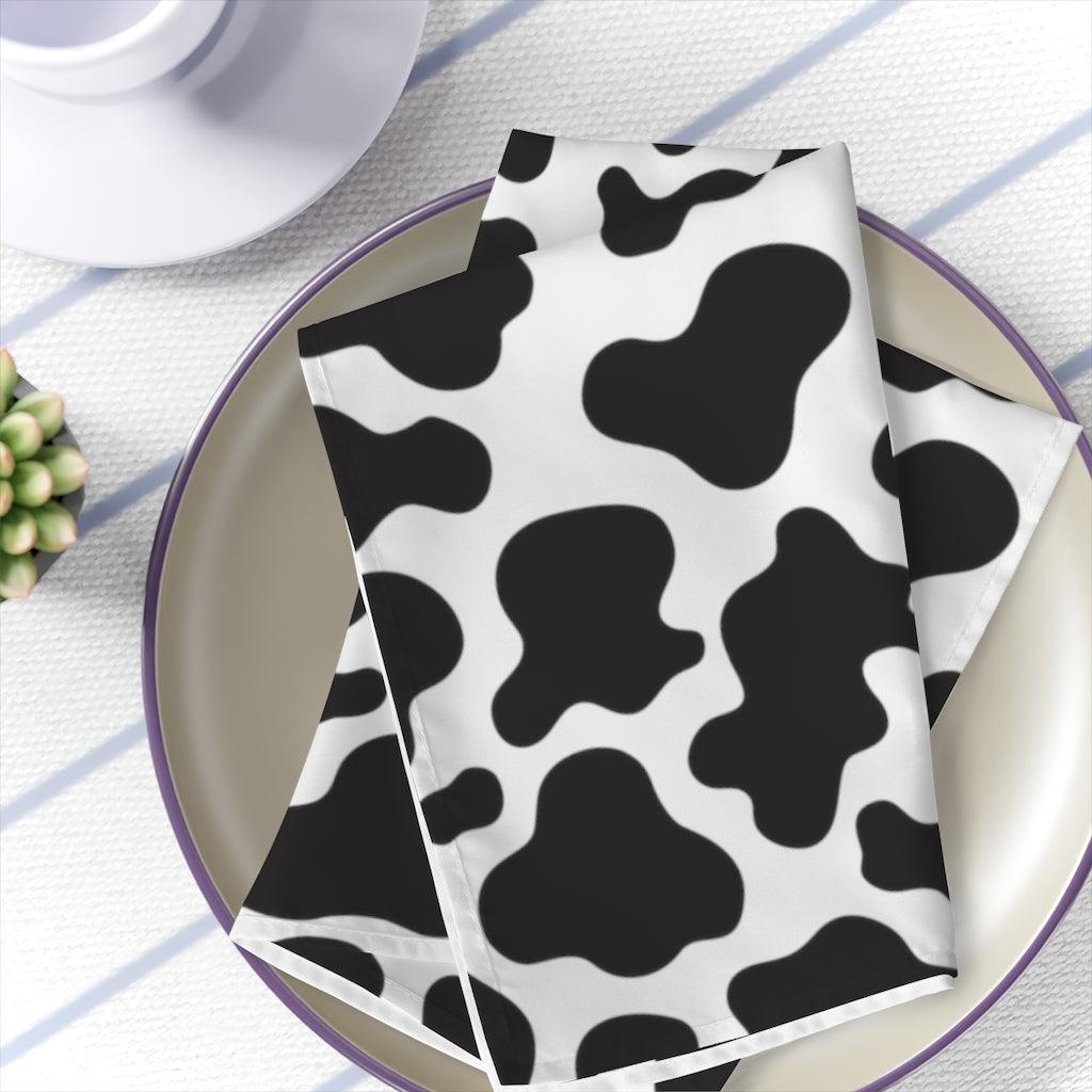 farmhouse dinner napkins in cow print black and white 