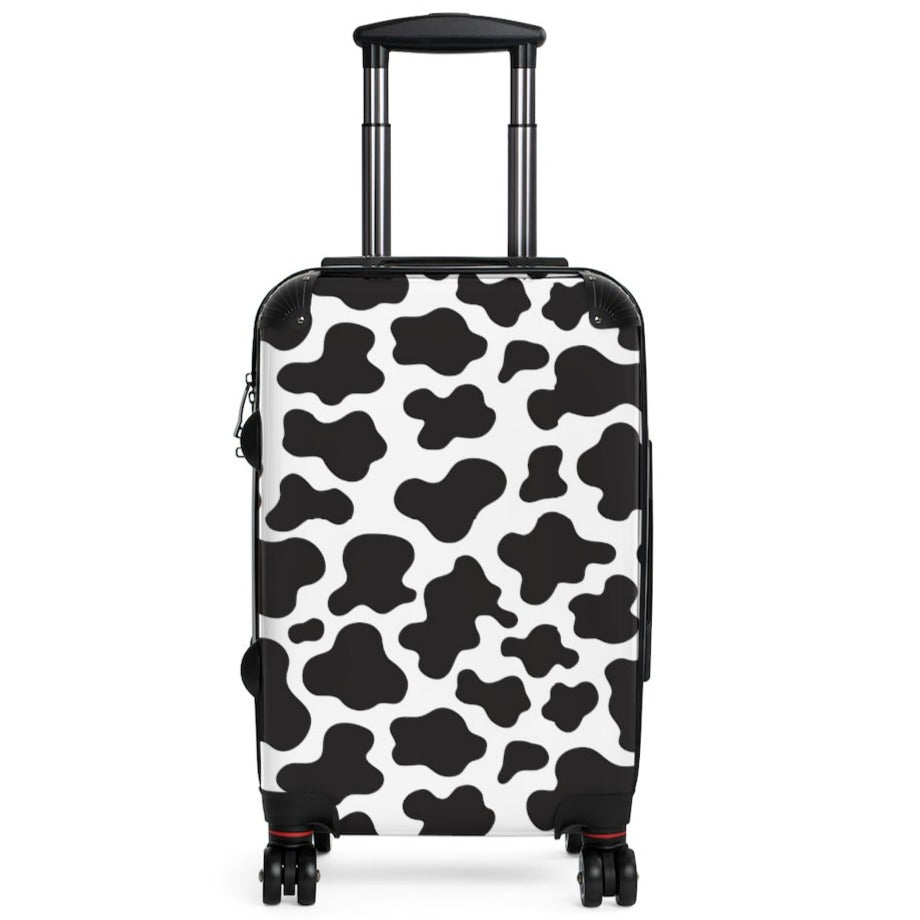 black and white cow print suitcase