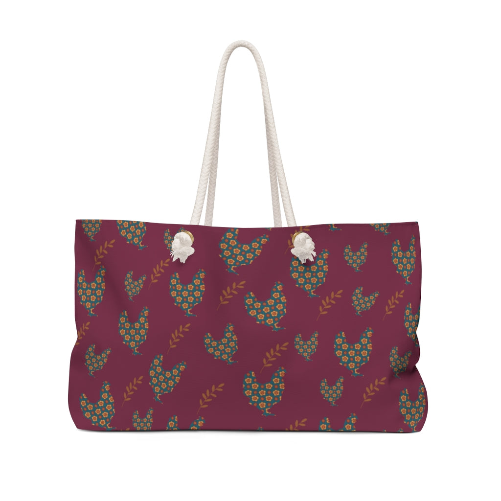 farmhouse rooster overnight bag with rope handles. burgundy color with rooster pattern 