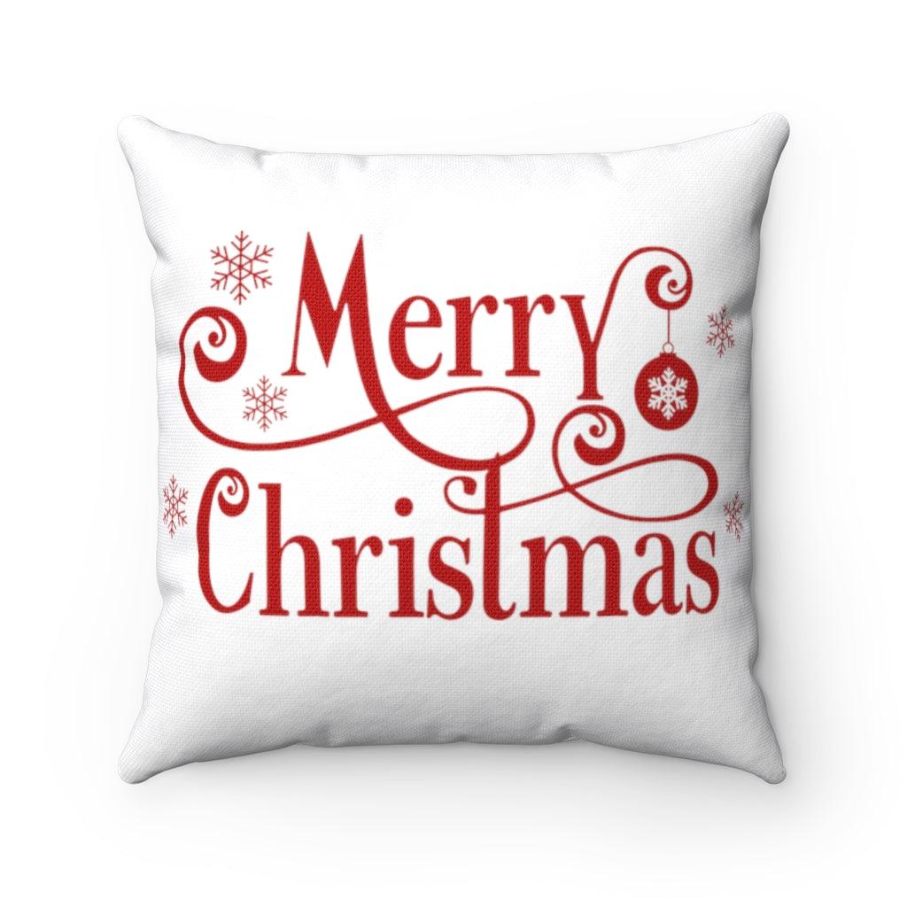 white christmas pillow with red merry christmas on front 