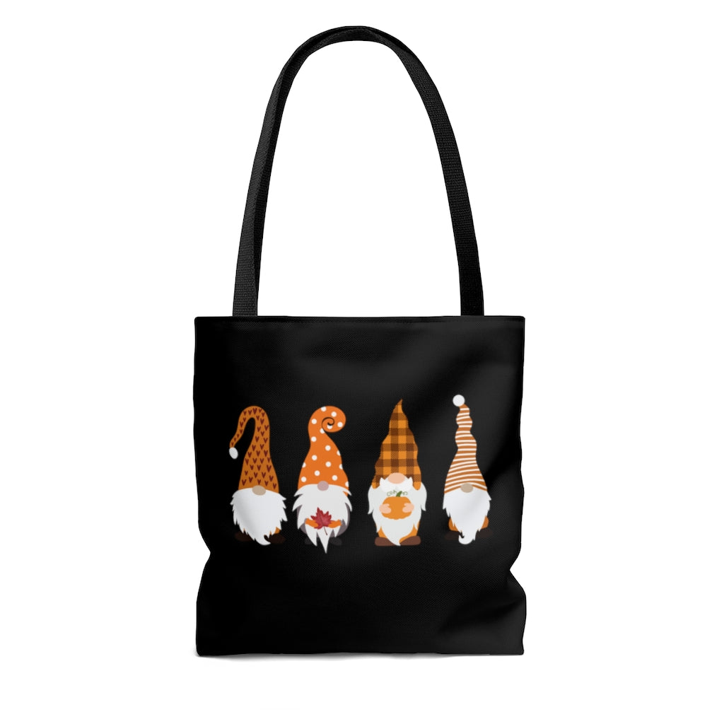 black halloween tote bag with 4 orange gnomes