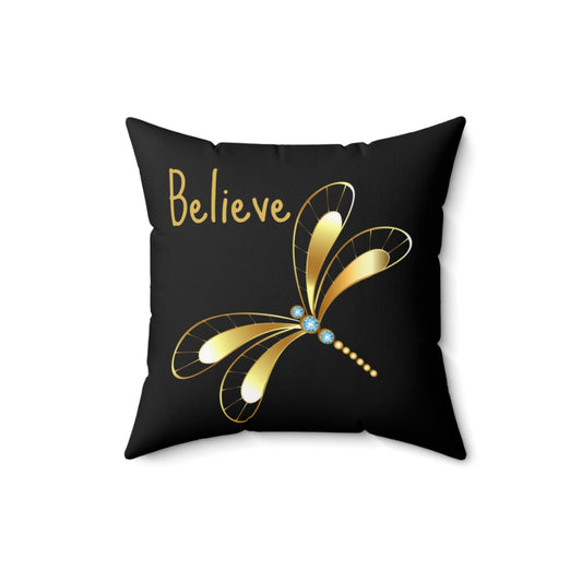 black pillow with gold dragonfly and believe