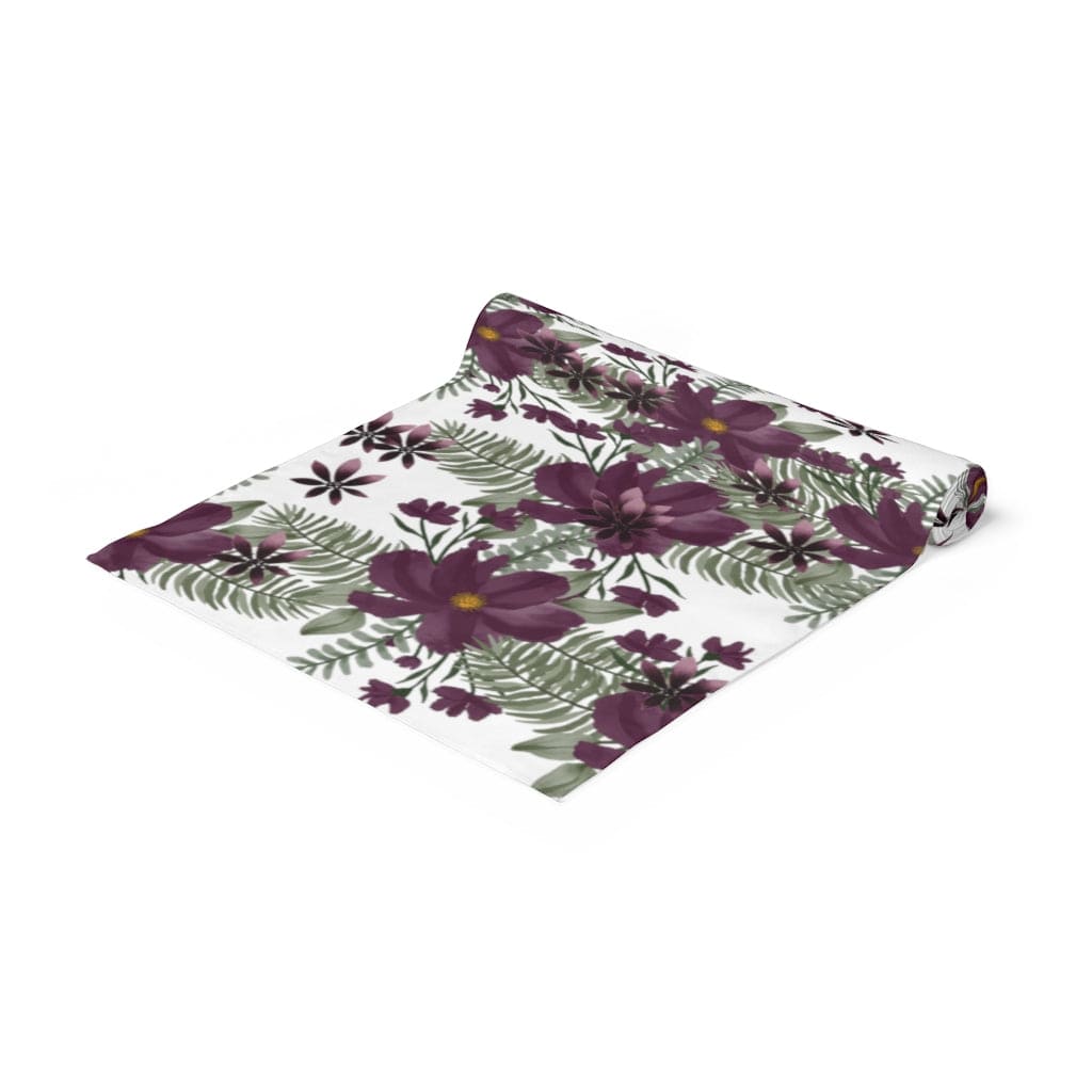 purple table runner with flowers and leaves