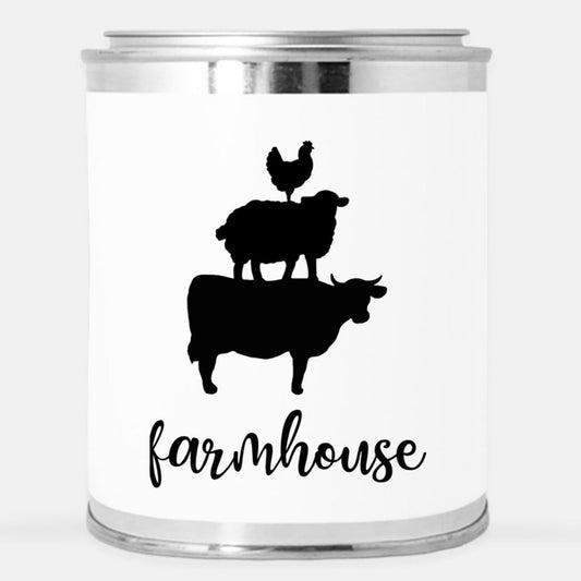 farmhouse candle with cow, pig, sheep and rooster stacked in black and white