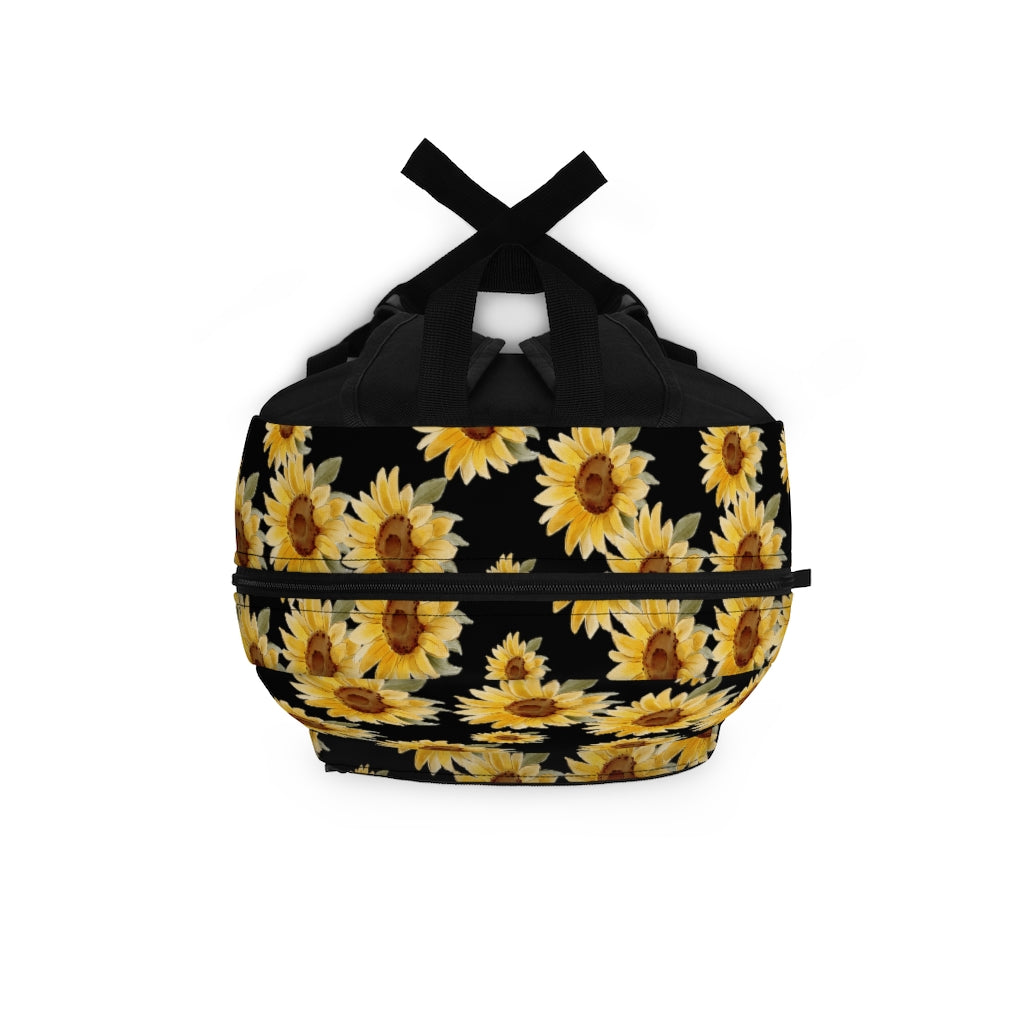 top view of black backpack with yellow sunflowers