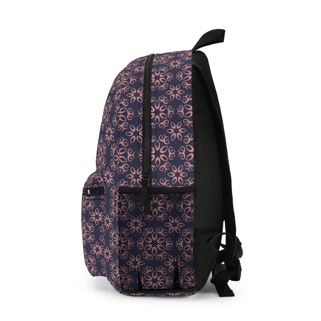 side view of womens geometric backpack in blue and pink colors