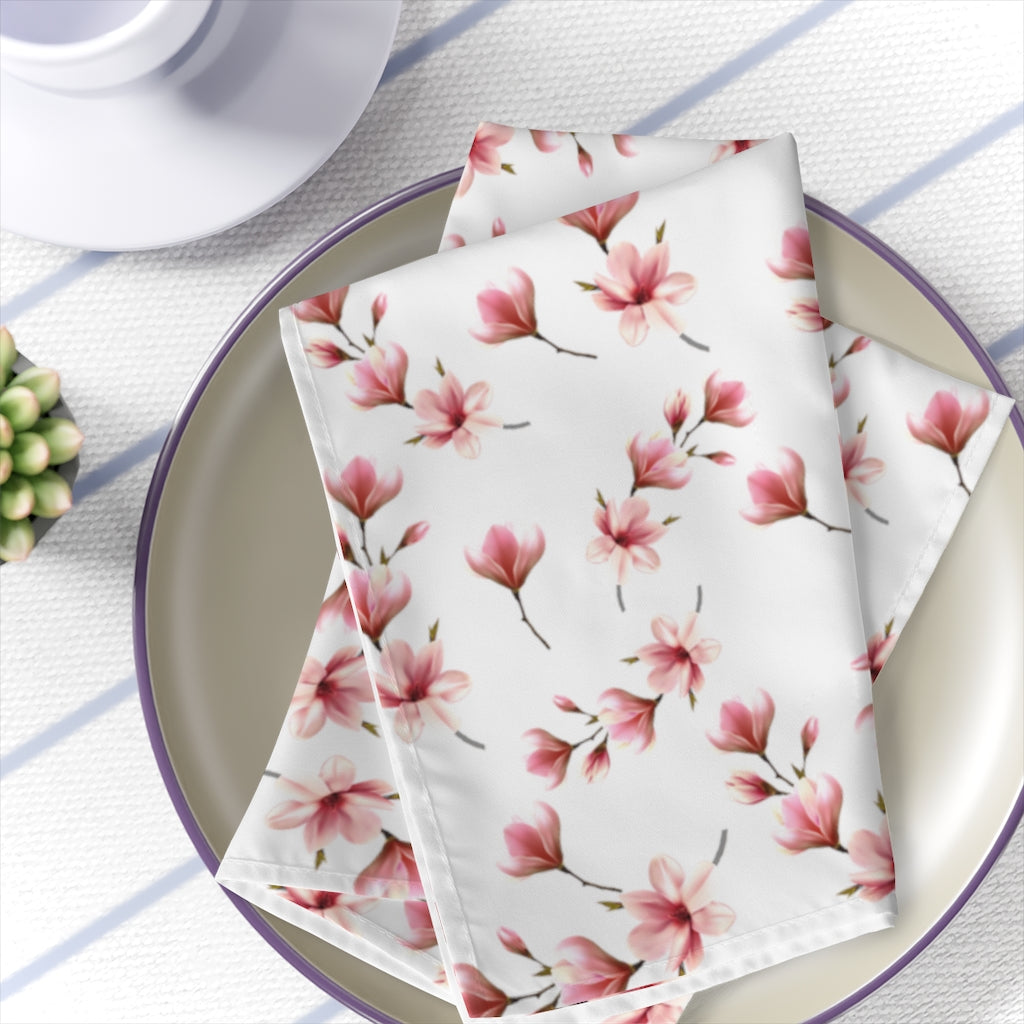 magnolia flower dinner napkins with pink flowers on white background