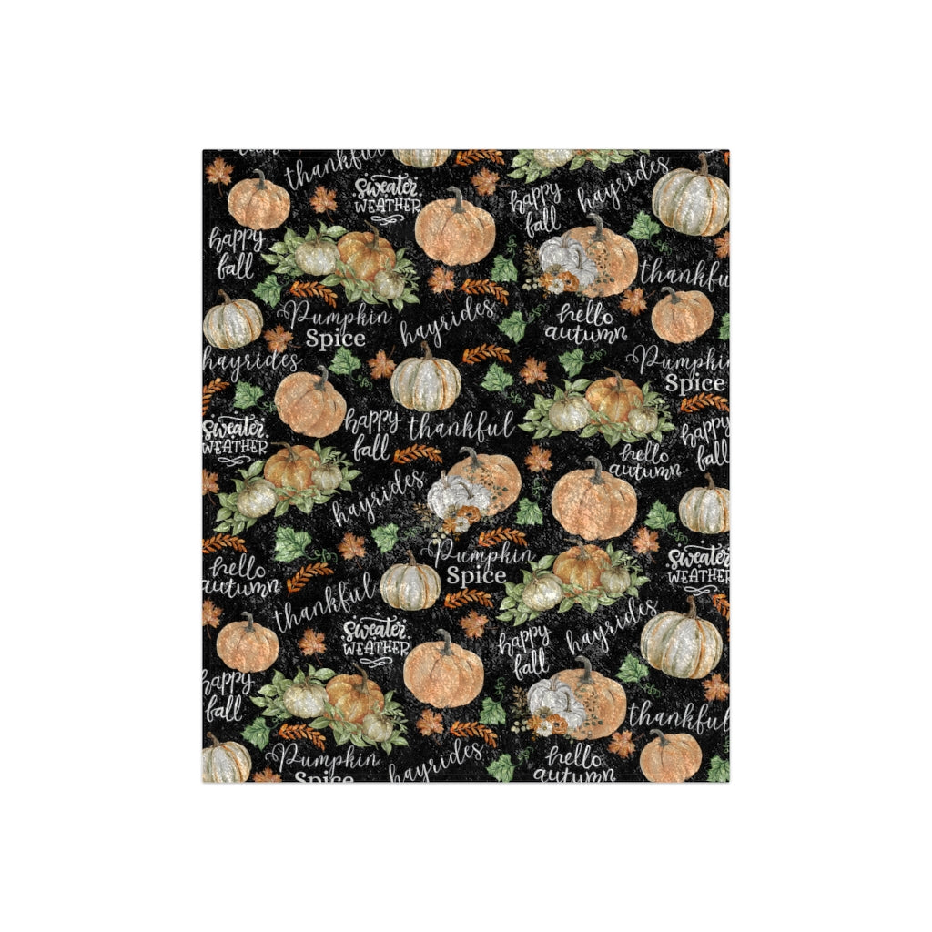 flat view of fall blanket with pumpkins and hayrides, happy fall, hello autumn, pumpkin spirce and sweater weather sayings