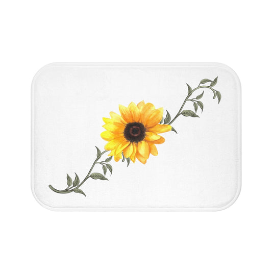 white bath mat with yellow sunflower and green leaves