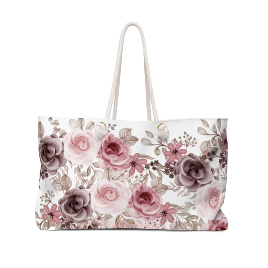 floral travel bag with pink and purple rose pattern for a wedding or honeymoon