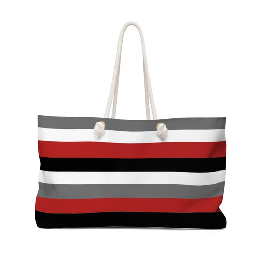 red, gray, black and white striped overnight travel bag with rope handles 