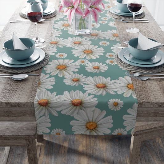 teal table runner with white daisy pattern