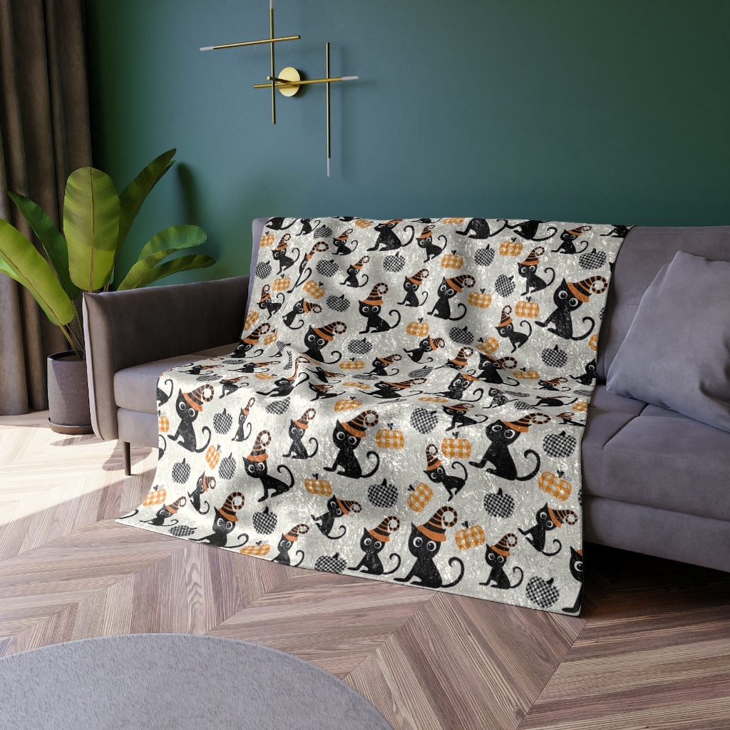 halloween cat blanket with pumpkins and black cat pattern
