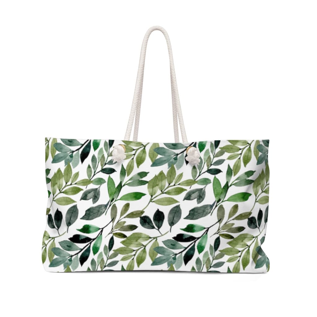farmhouse leaf weekender bag with blue and green leaves on a white background.  Rope handles.