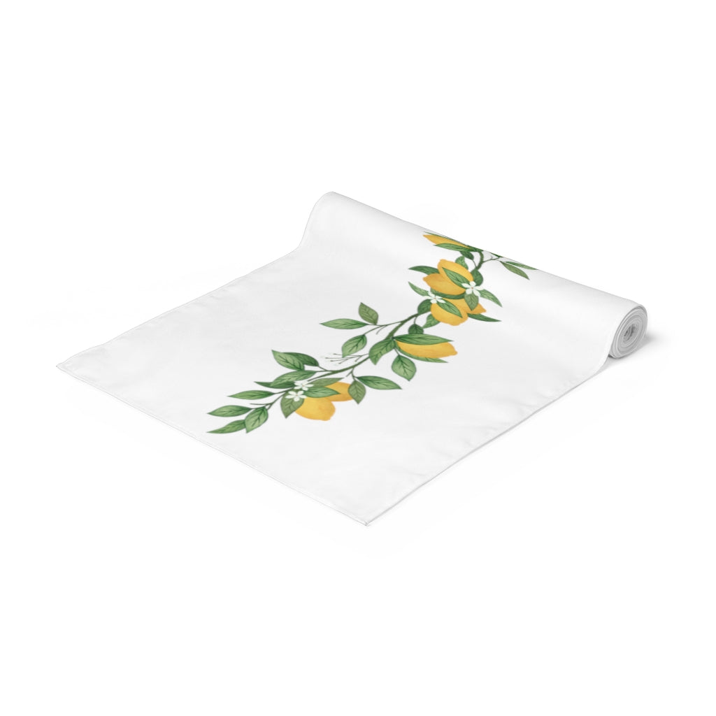 white flower and lemon table runner