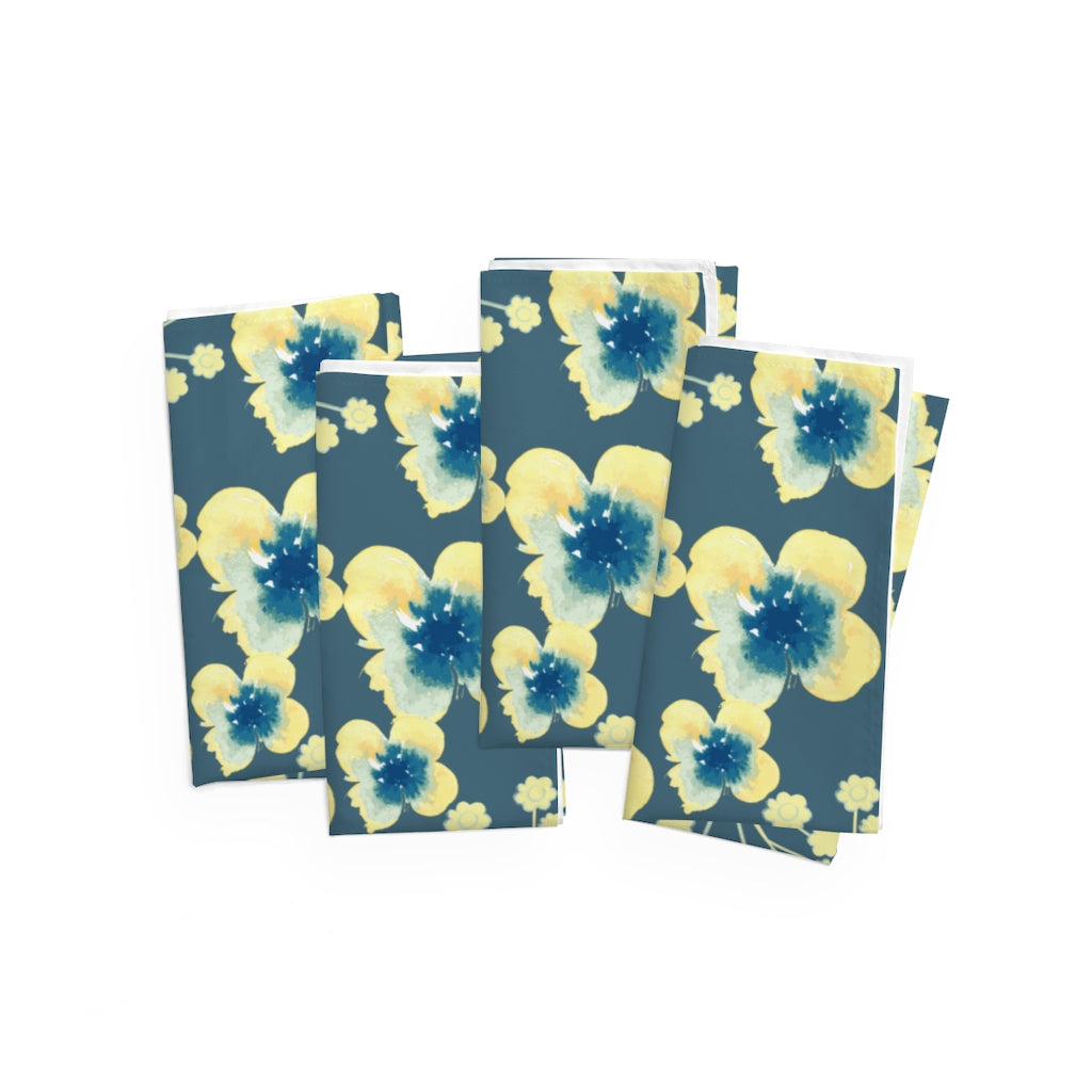 set of 4 yellow flower napkins with blue background