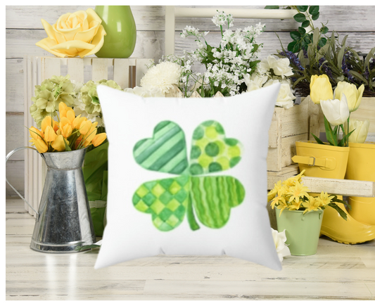 st patricks day pillow with a single shamrock in minimalist style
