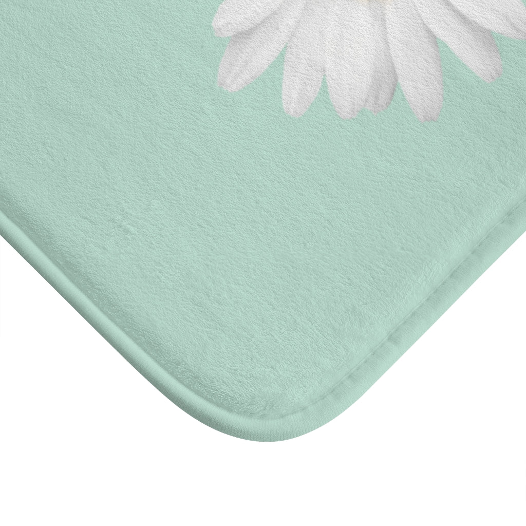 close up of the blue daisy bath mat