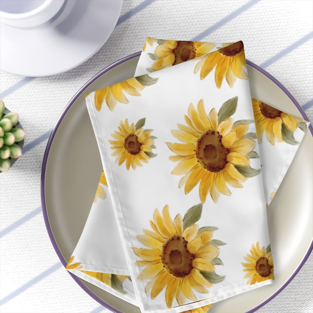 sunflower napkin with a watercolor sunflower pattern on a white background