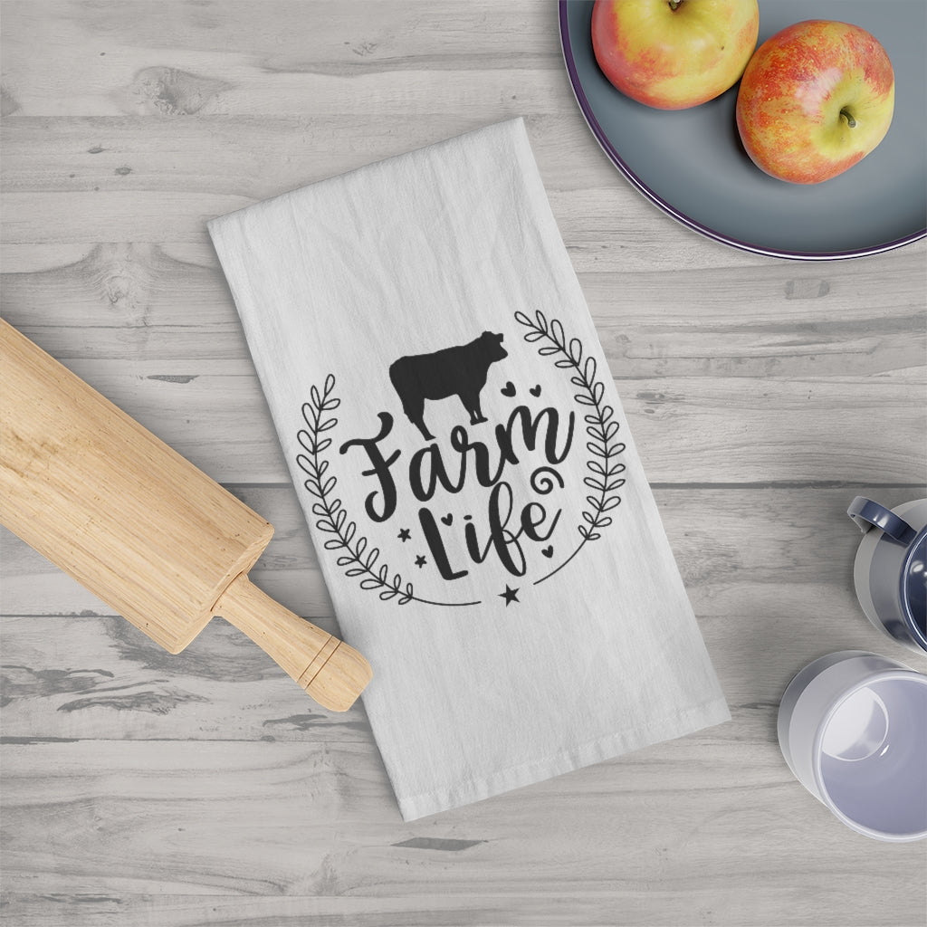 farmhouse tea towel with farm life saying and a cow with hearts 
