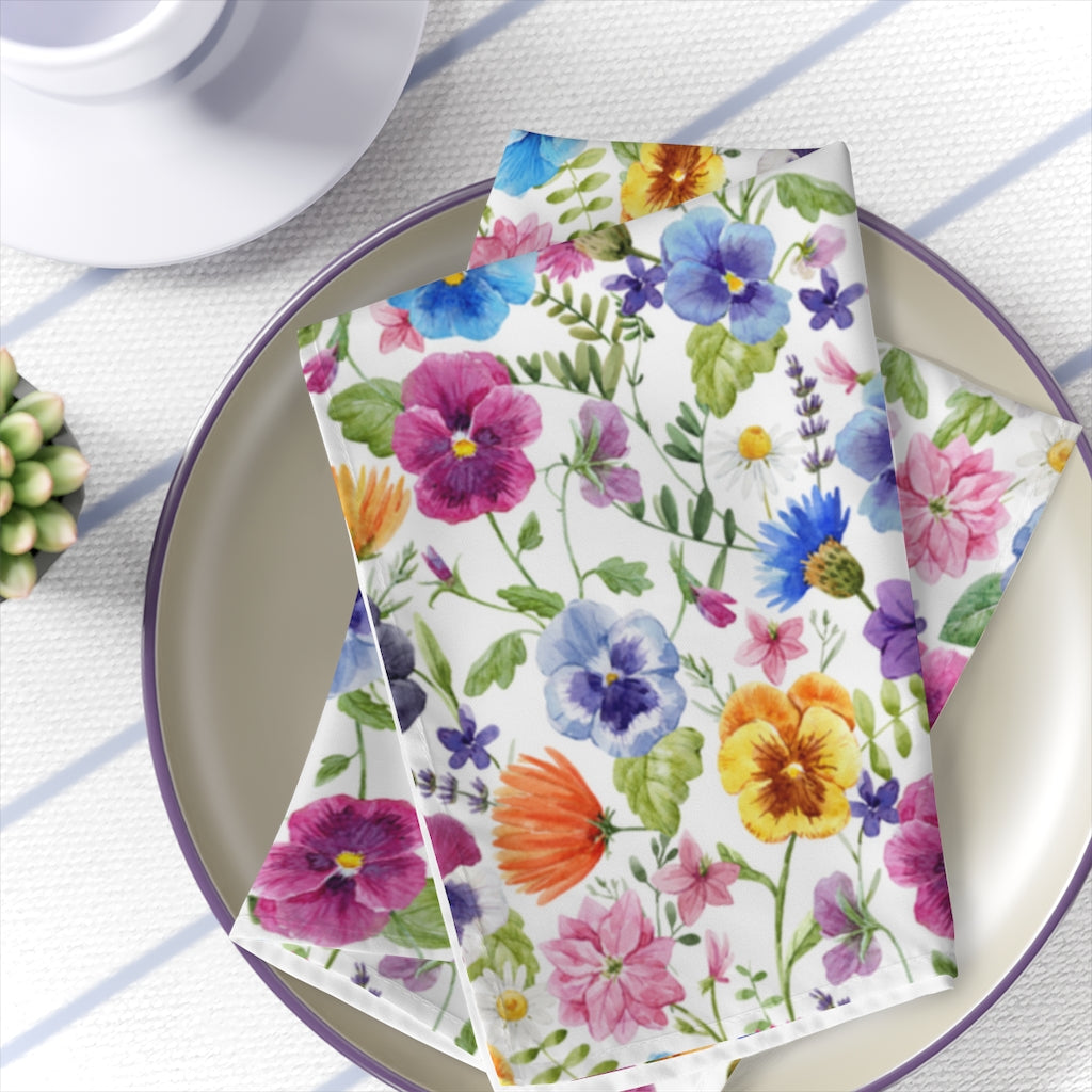 wildflower dinner napkins with blue, purple, yelllow and orange flower print