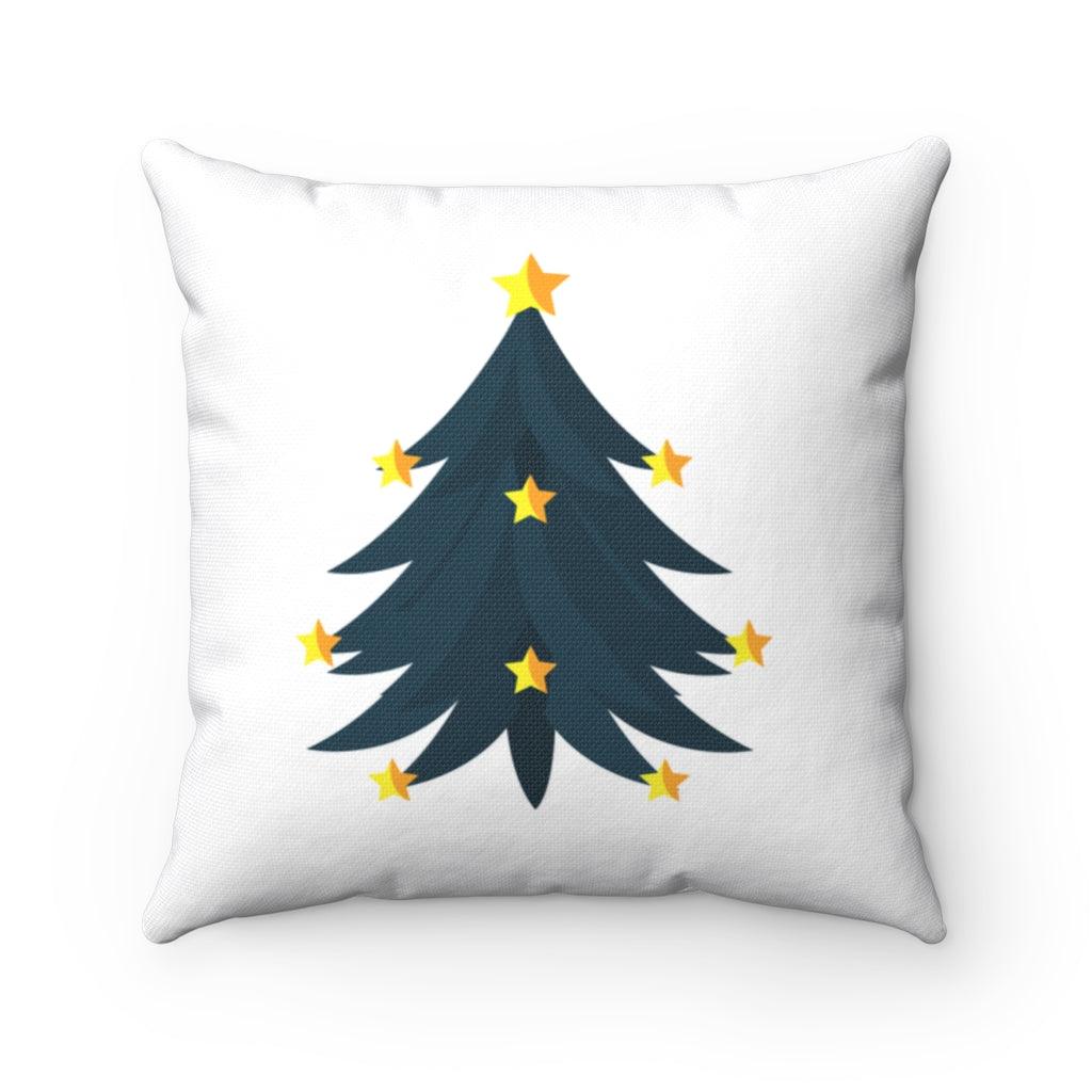 white christmas pillow with blue tree and yellow stars 