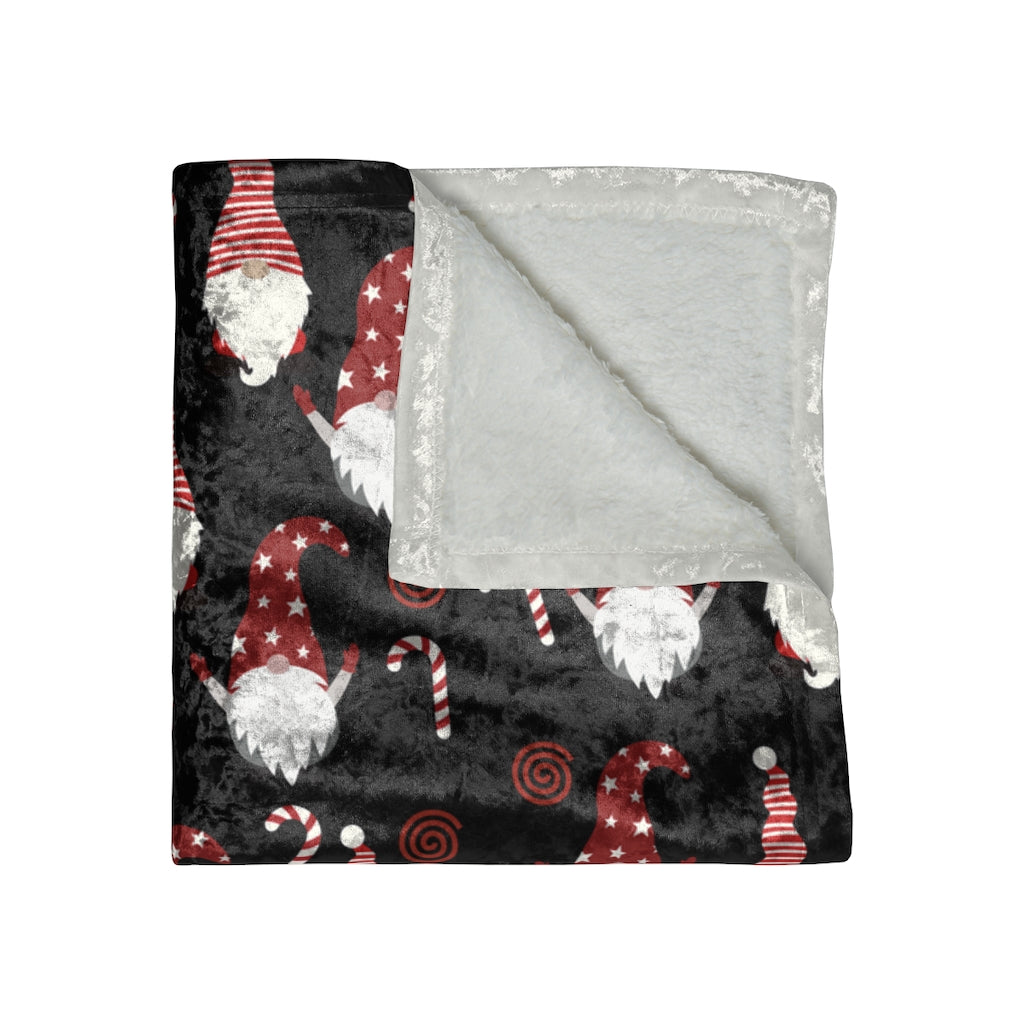 christmas gnome blanket in black with red and white gnomes and candy canes