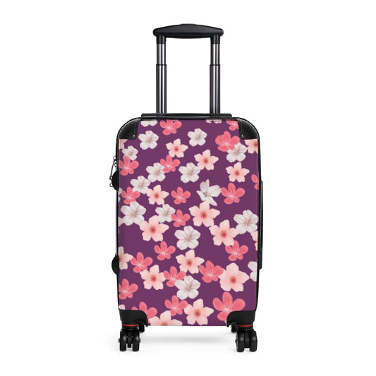 cherry blossom suitcase with purple background and white and pink flowers