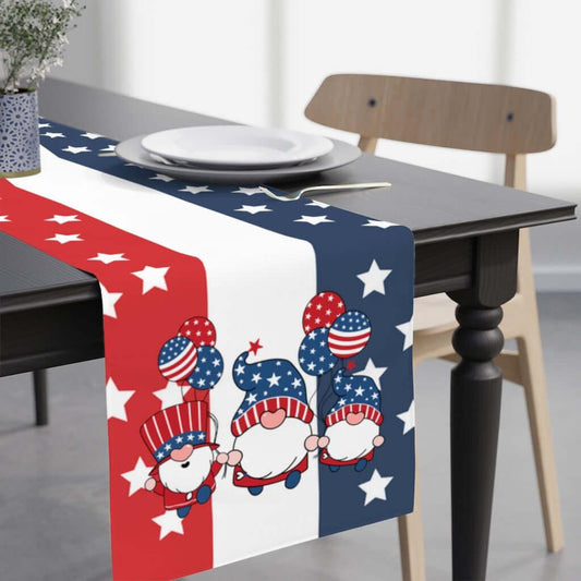 gnome patriotic decor. A table runner with gnomes and star and stripes in red, white and blue 
