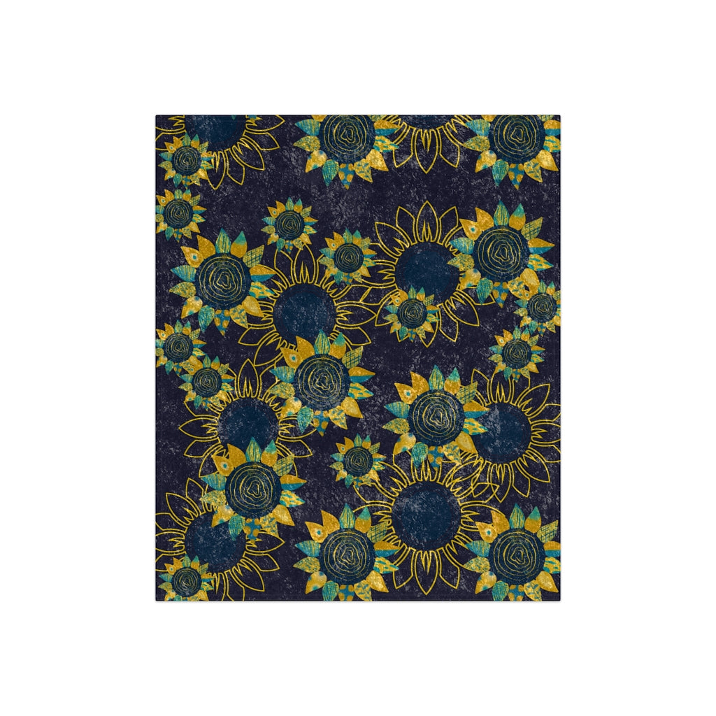 flat view of sunflower blanket in navy blue color with yellow sunflowers