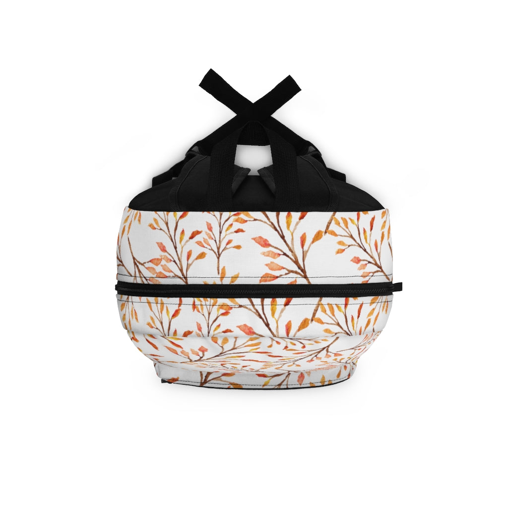 womens backpack in leaves and branch pattern in orange and brown colors